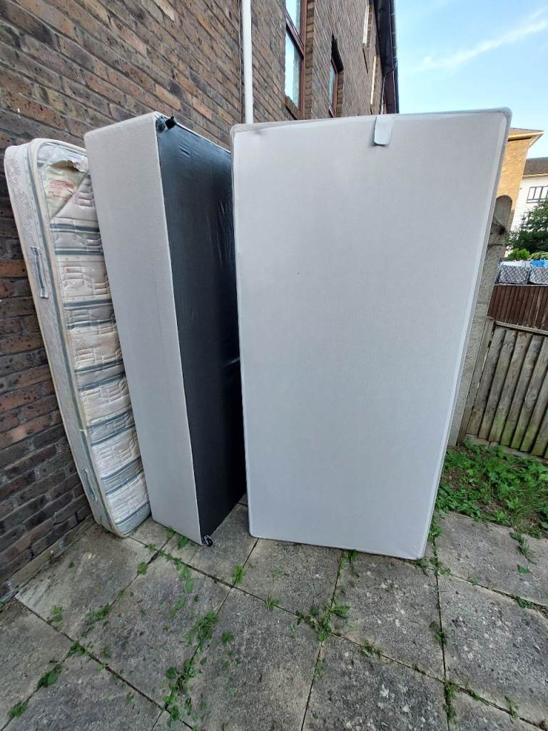 Free 2 new single beds with mattresses 