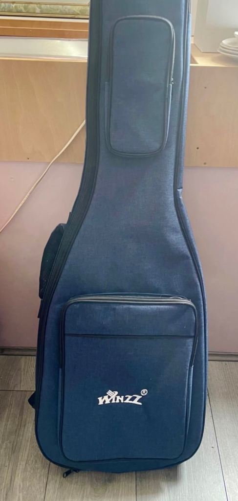 Like New Winzz navy blue padded Guitar Case 
