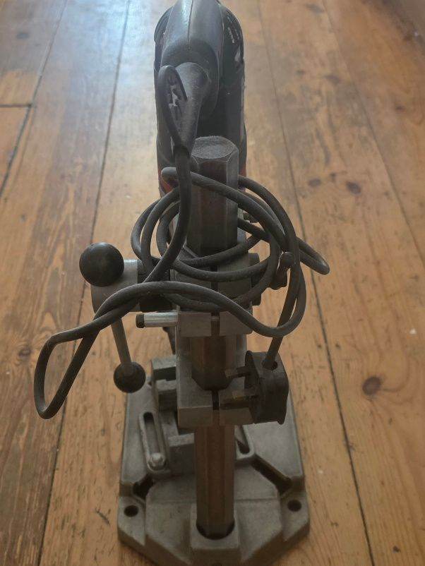 A Metabo SBE 705 drill, Made in Germany, mounted on a Wolfcraft drill stand with a vice.