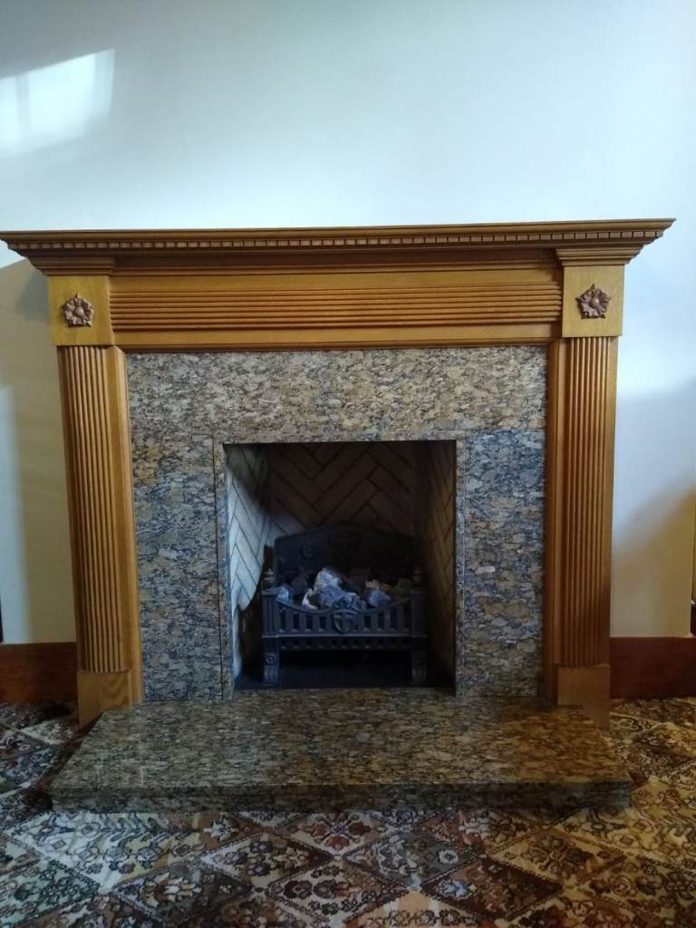 Oak Fireplace and Granite surround 