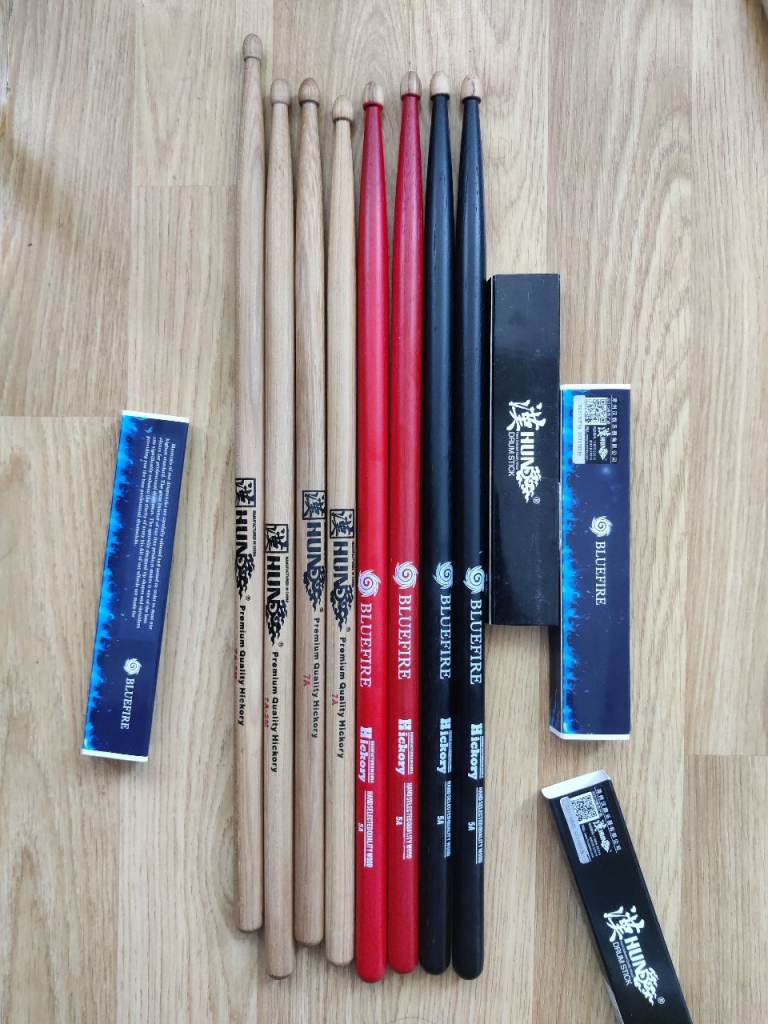 Brand New Drum Sticks - Natural, Black, and Red Pairs