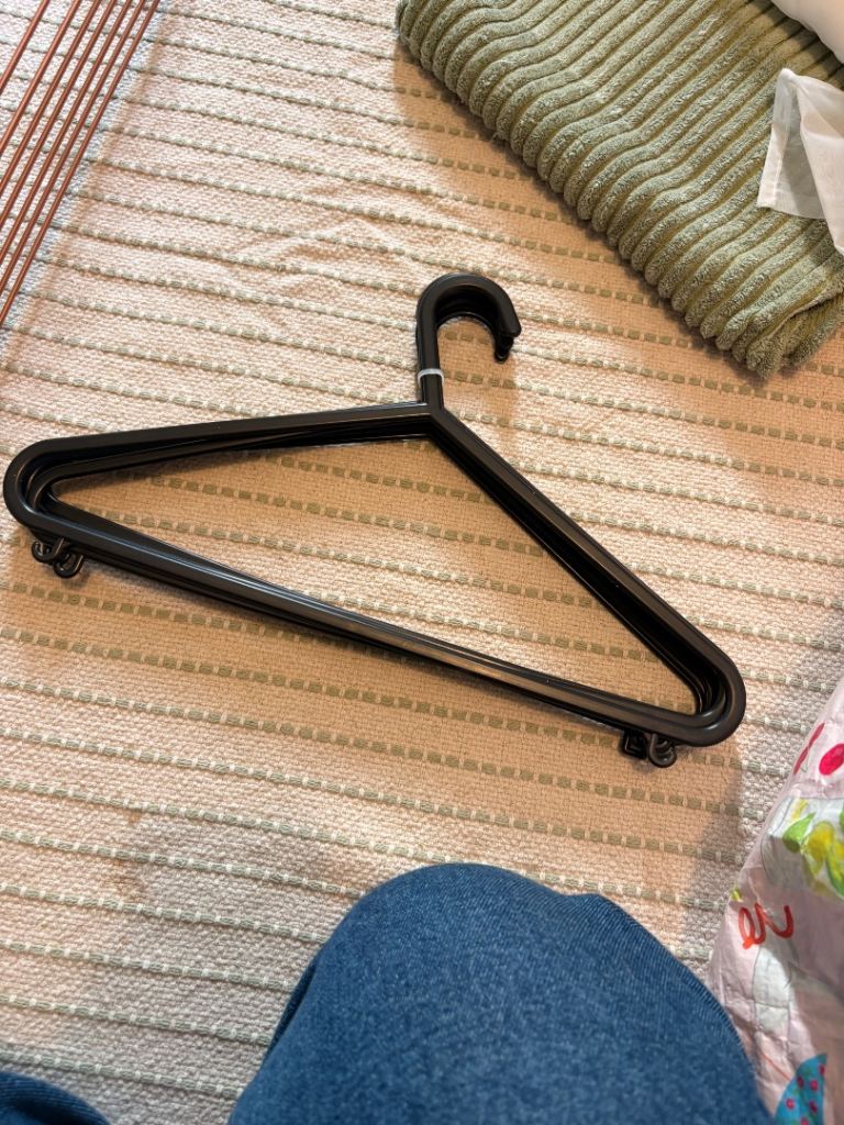 RESERVED - bundle of coat hangers 