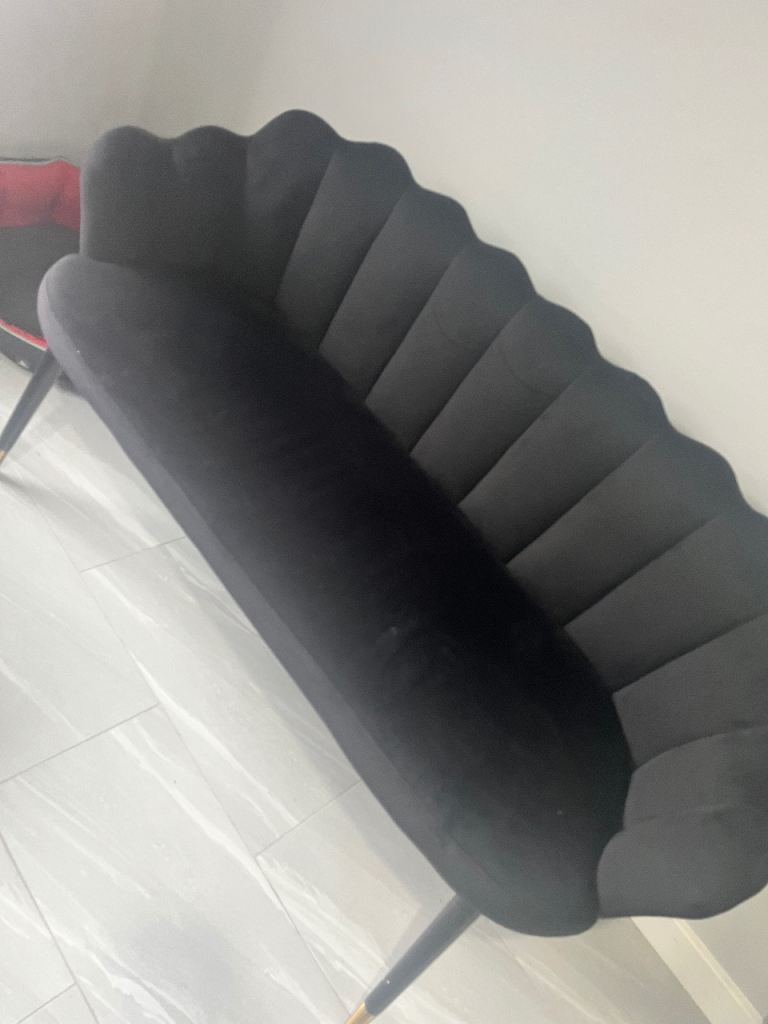 Navy accent sofa scalloped back 