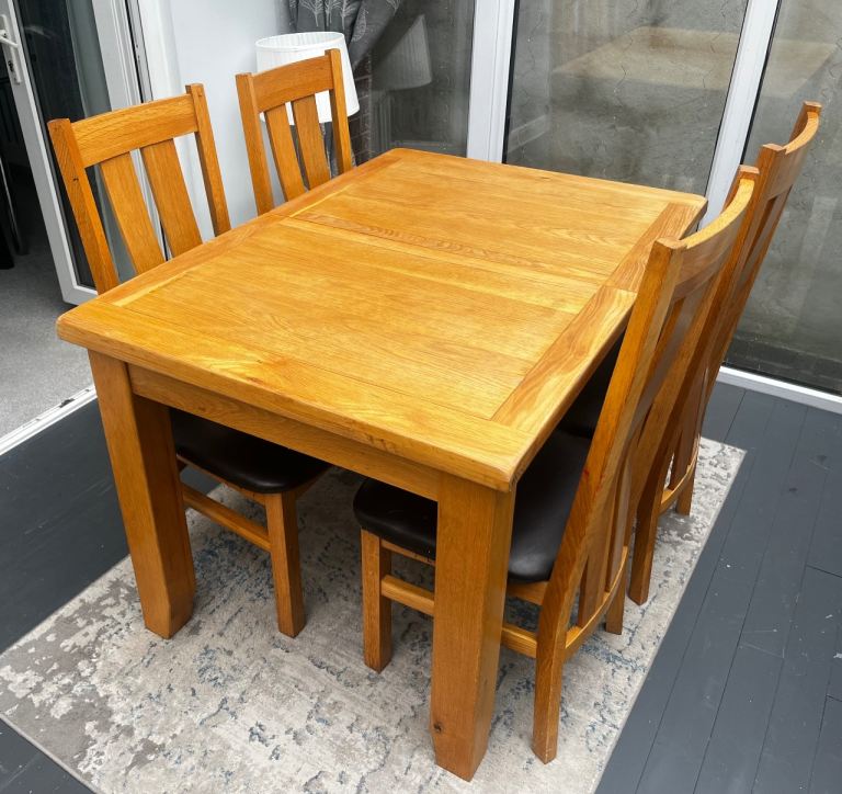 Oak dining table and chairs  