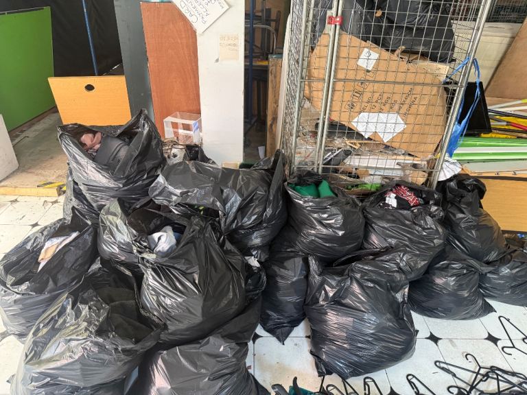 Large Quantity of Clothes Hangers and Bags of Mixed Items