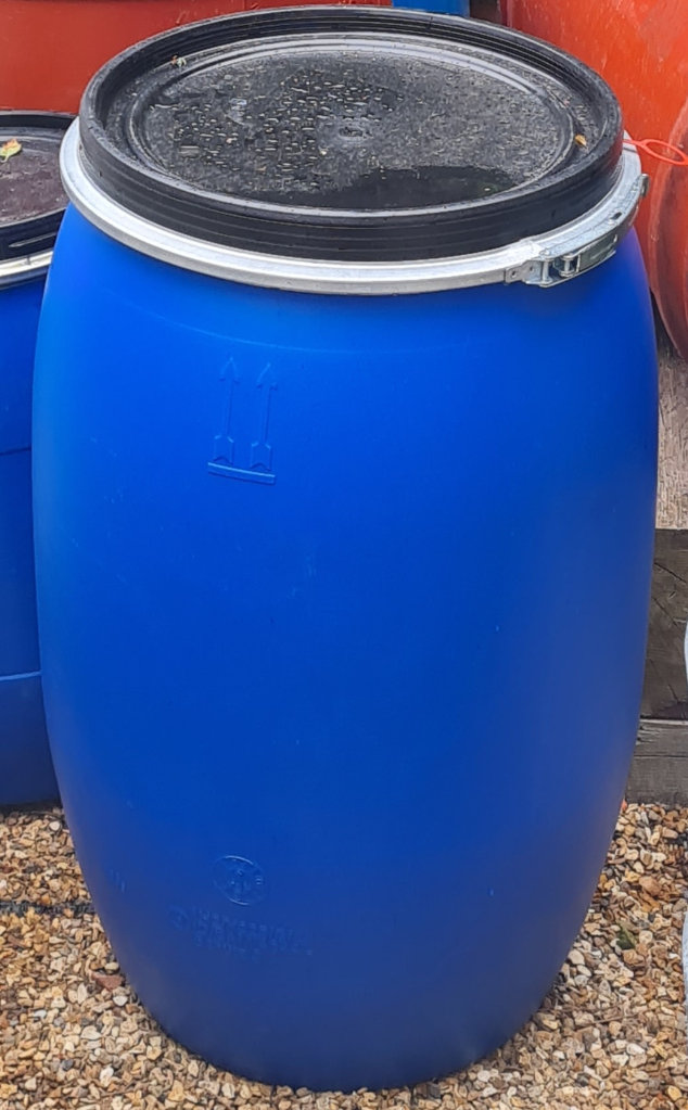 Large plastic storage barrel with lockable lid