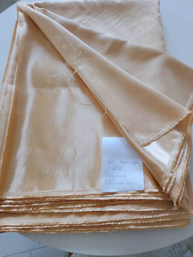 Satin back dupion. Gold fabric remnant