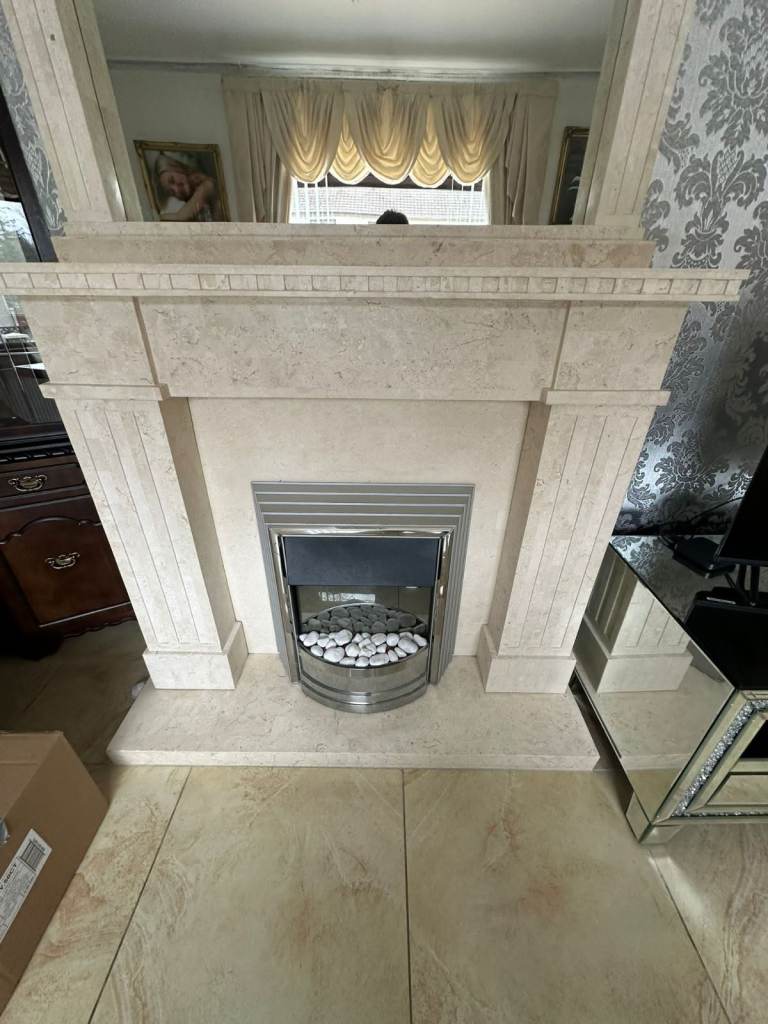Really nice heavy marble fireplace with electric fire insect and matching mirror £250