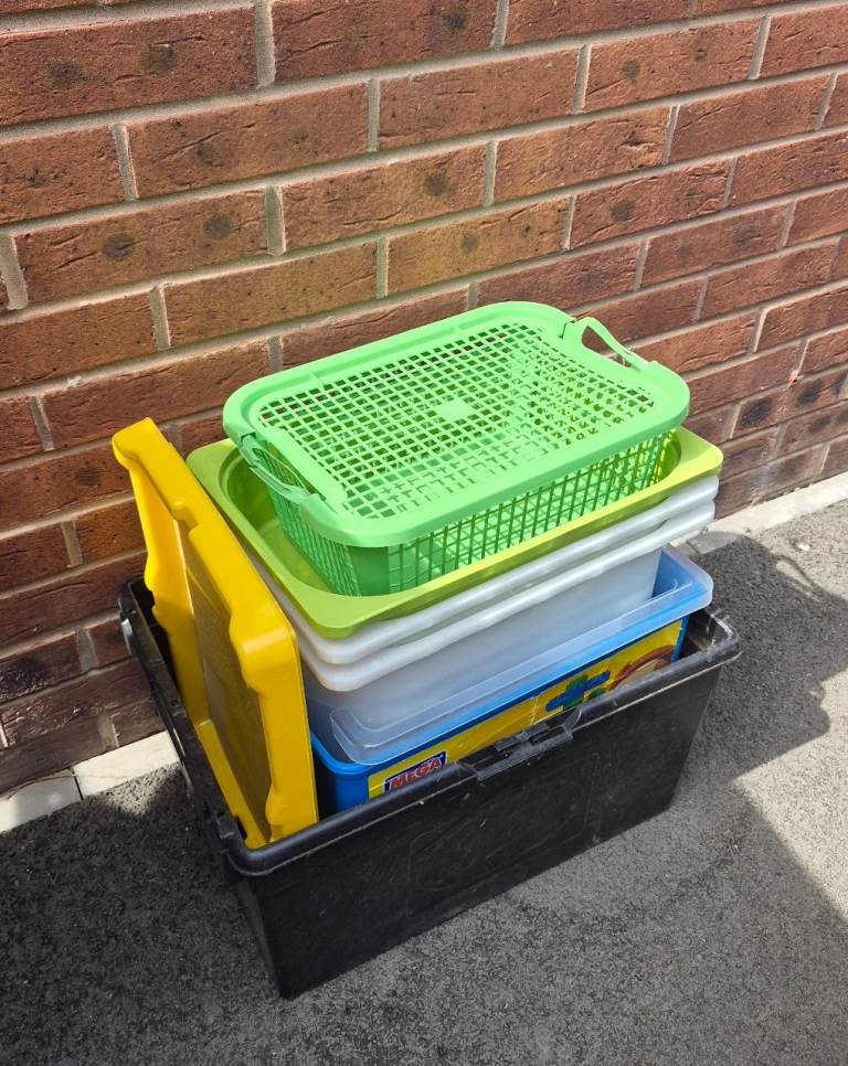 Various plastic storage boxes. Free