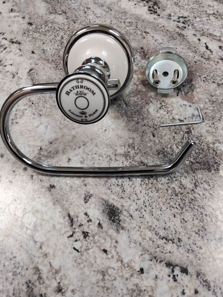 Traditional ceramic and chrome toilet roll holder
