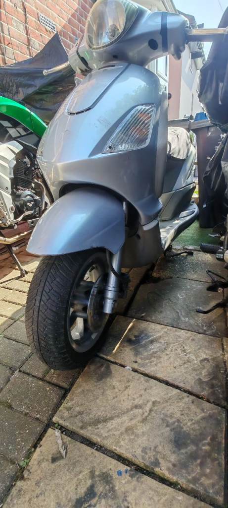 Silver Scooter - Good Condition