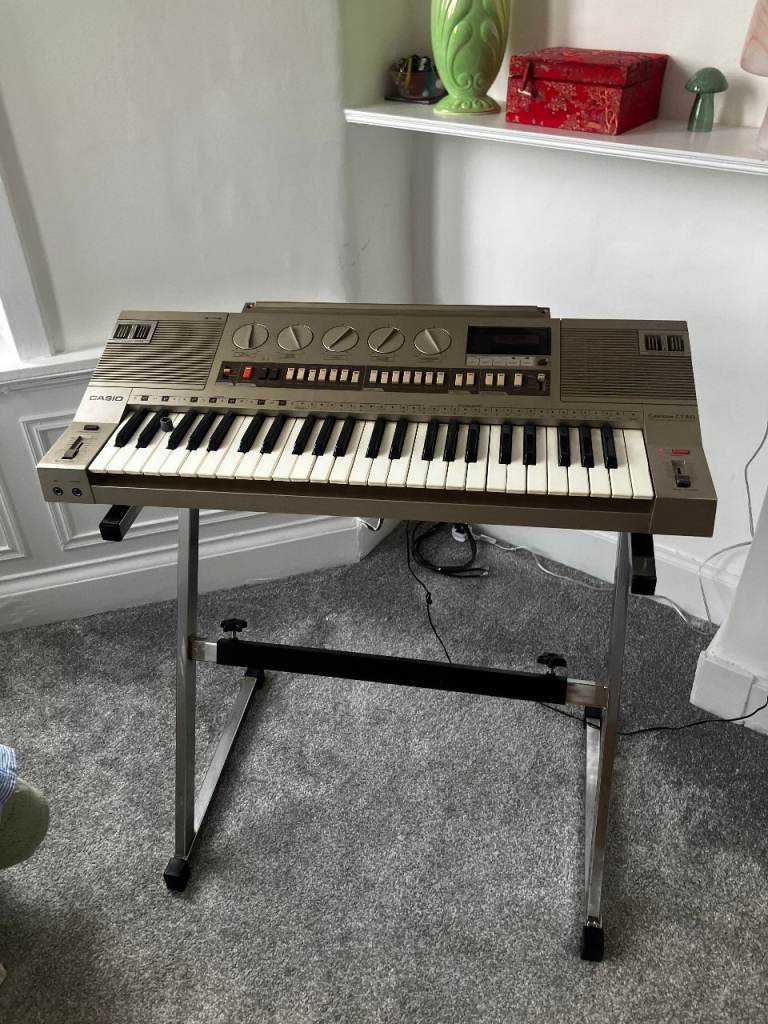 Casio Keyboard with Stand – Good Condition