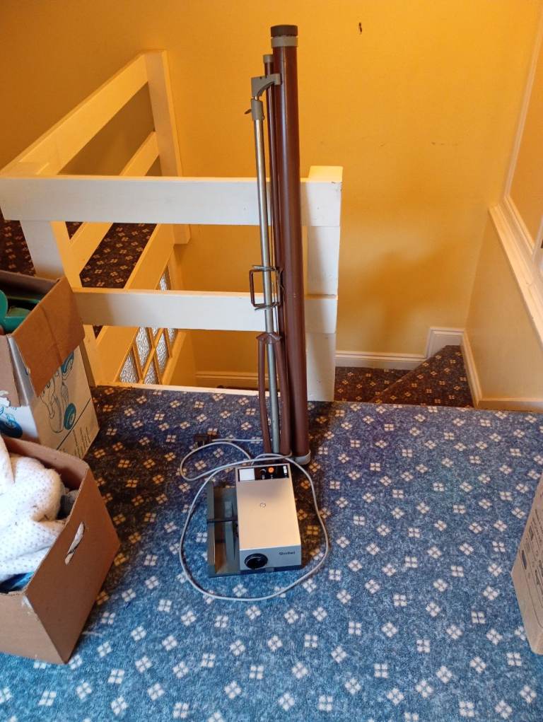 Rollei 35mm slide projector and folding screen