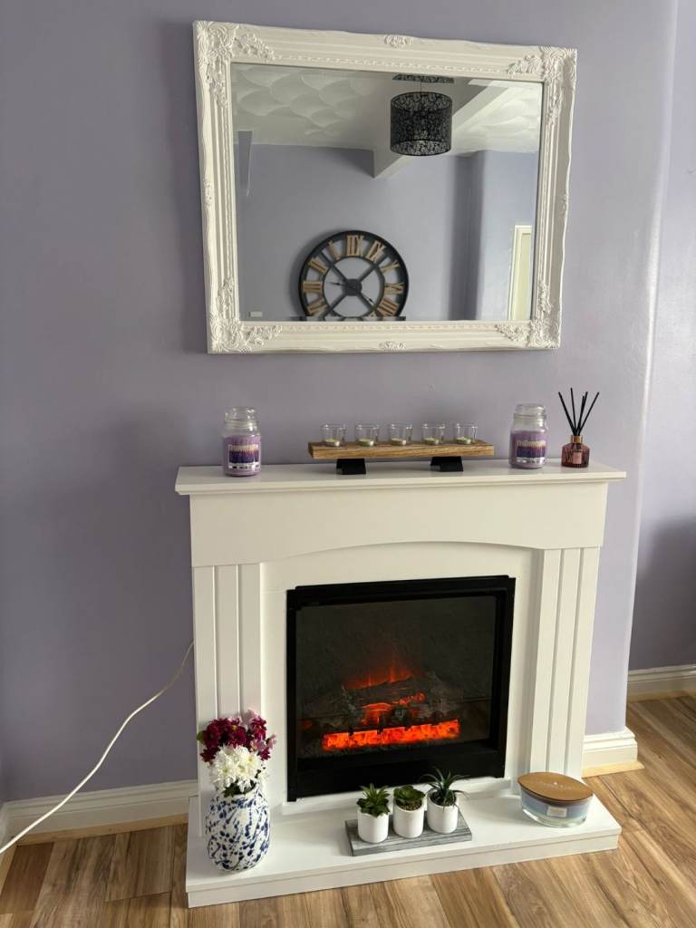 White fireplace and mirror £75