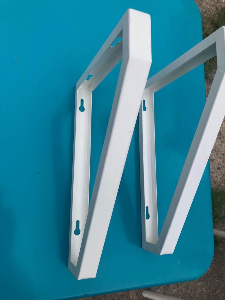 Metal shelf brackets