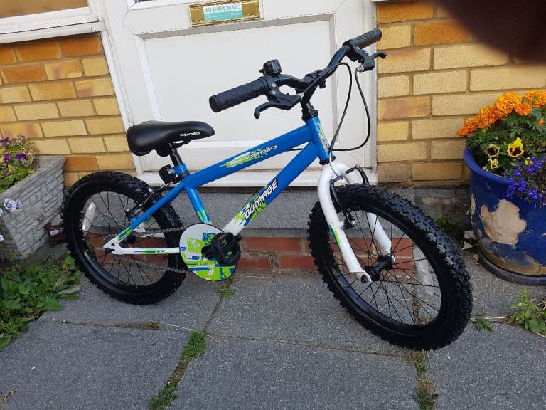BOYS 18" WHEEL OUTRAGE BIKE IN GOOD WORKING CONDITION AGE 6+