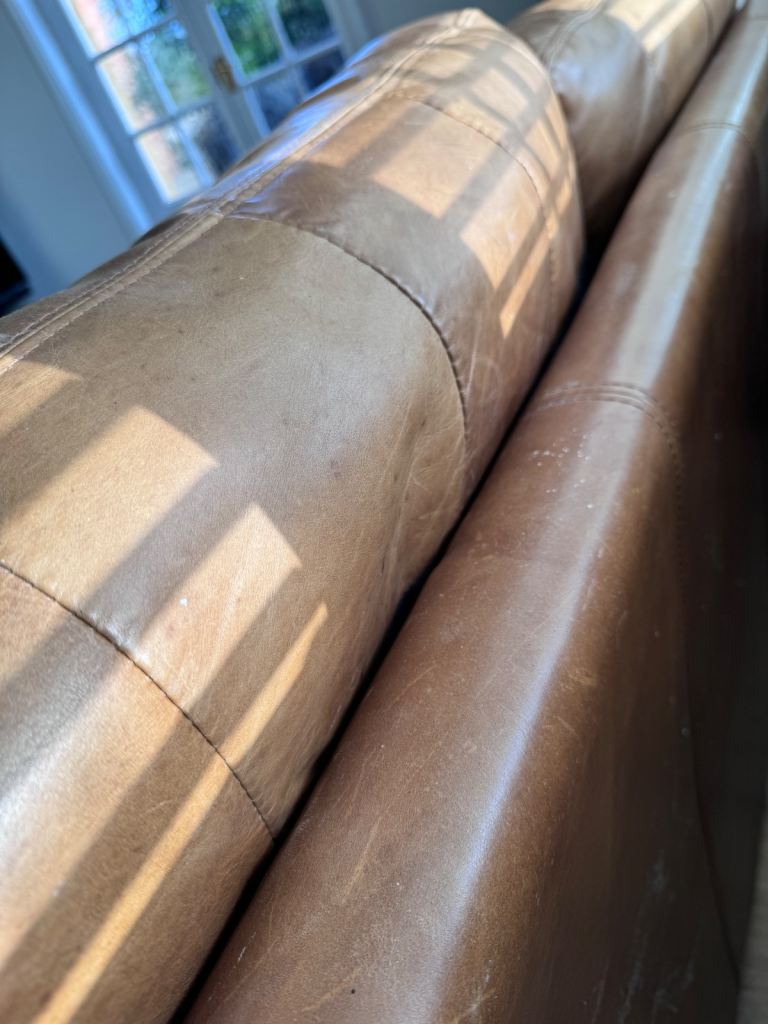 Tan Italian leather sofa original cost £2300