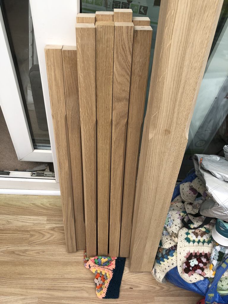 Oak newel and spindles.