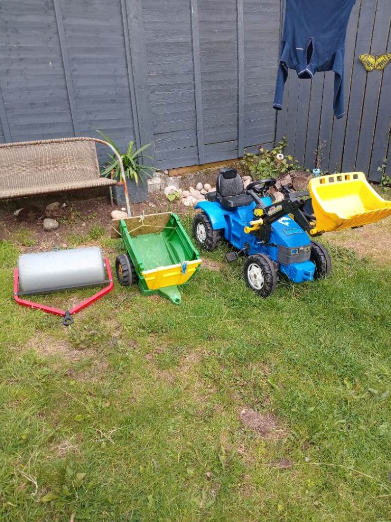 Pedal tractor with loader, trailer, and roller for sale