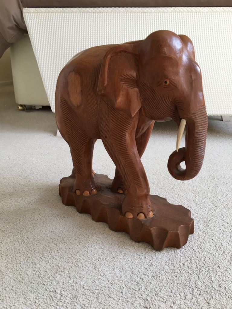 image for Two hand-carved vintage wooden elephants 