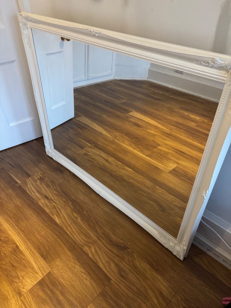 Ornate large white mirror