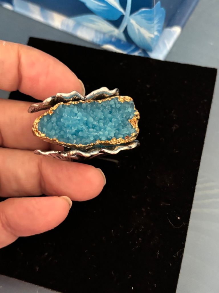 Unique Silver-Tone Ring with Blue Stone – Good Condition