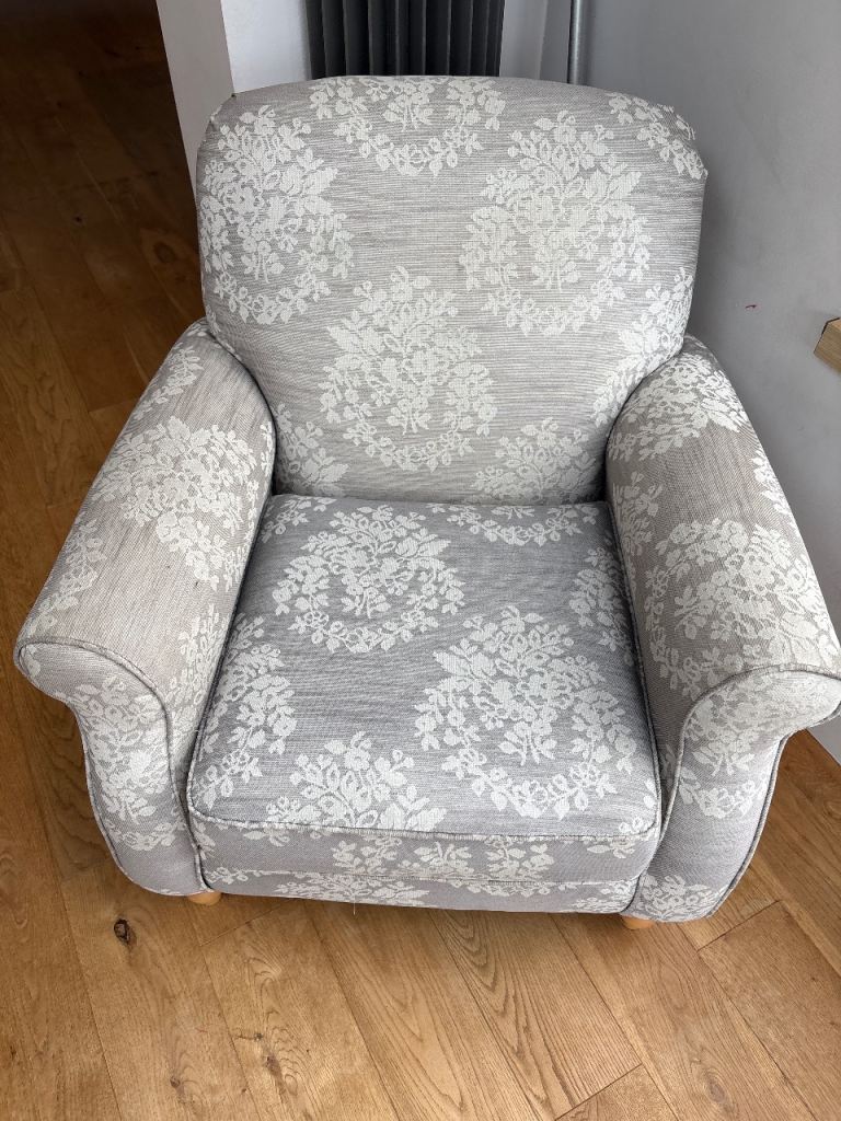 Comfortable Grey Floral Armchair – Good Condition