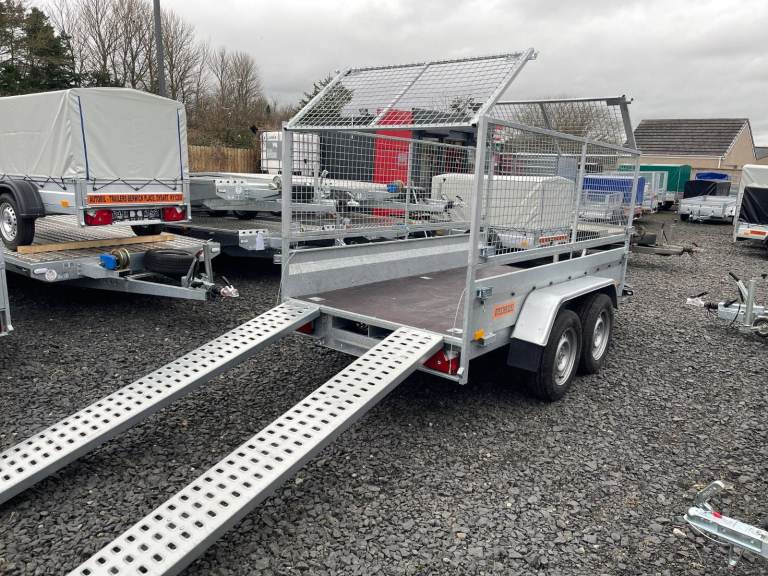 BRAND NEW 10FT X 5FT TWIN AXLE MASTER HEAVY DUTY TRAILER WITH 80CM MESH AND RAMPS 2700KG BRAKED