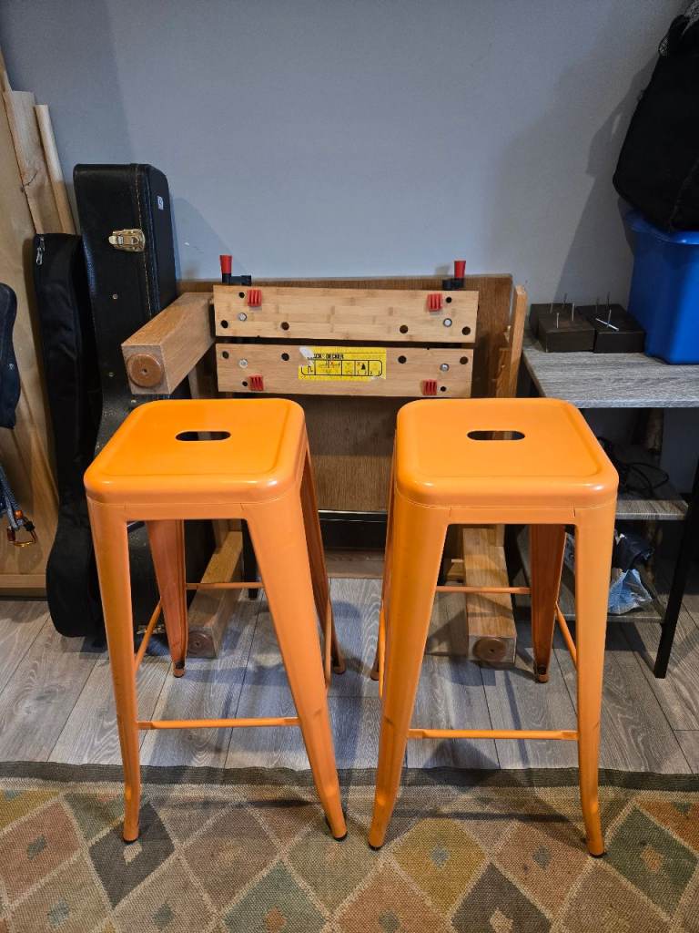 Vibrant orange bar stools