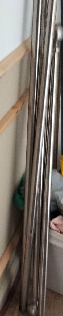 Two chrome curtain poles x 2
