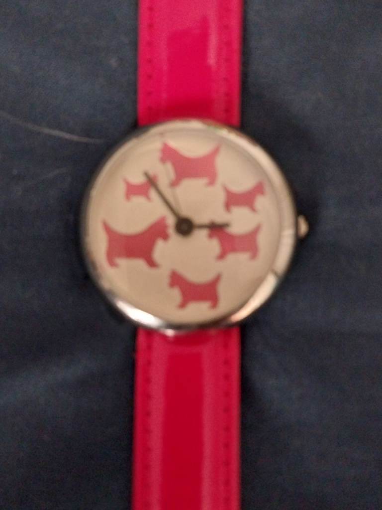 Pink Eton Watch with Dog Design – Good Condition