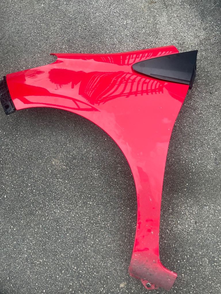 Toyota Yaris 2011-2017 passenger wing Red + trim+ bracket