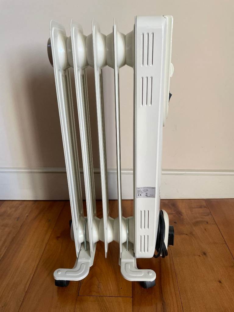 Portable oil Filled Radiator on wheels 1100W max