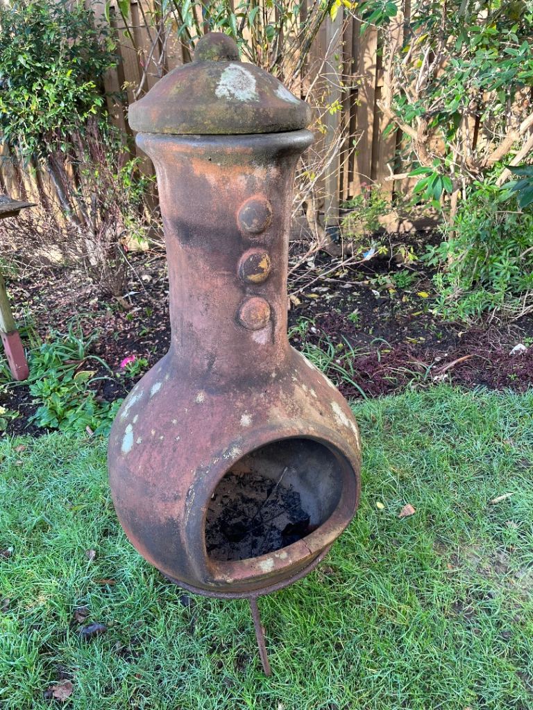 Large, outdoor, clay chimenea with lid and stand