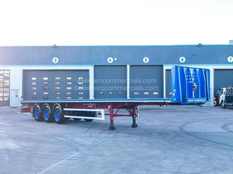 SDC FLAT BED TRI AXLE TRAILER