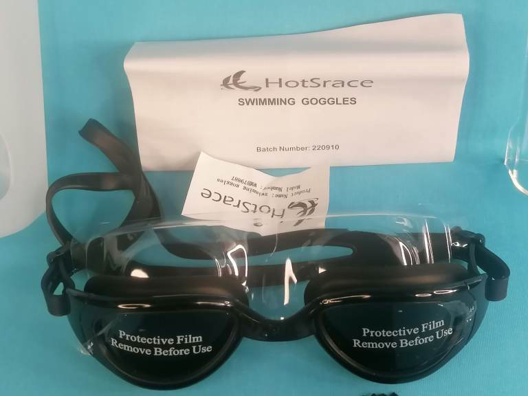 Brand new HOTSRACE swimming goggles. Adjustable. New..