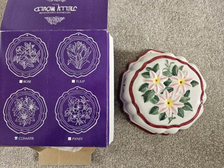 Selling a new decorative ceramic Jelly Mould Clematis (8 inches).
