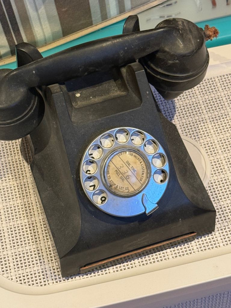 Vintage black rotary dial telephone