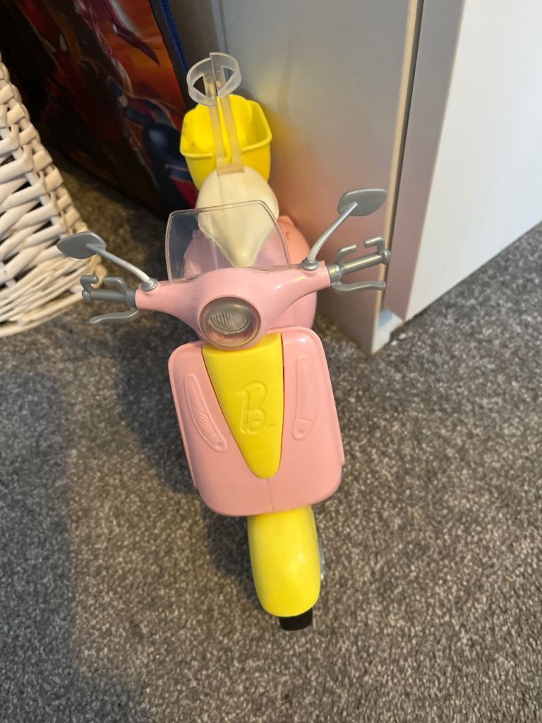 Barbie motorcycle with dog and helmet 