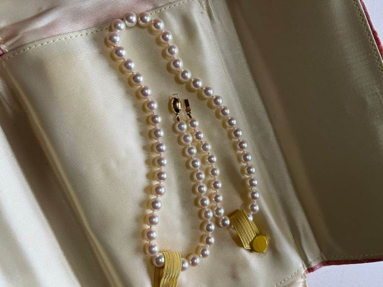 Pearl necklace in Japanese brocade case