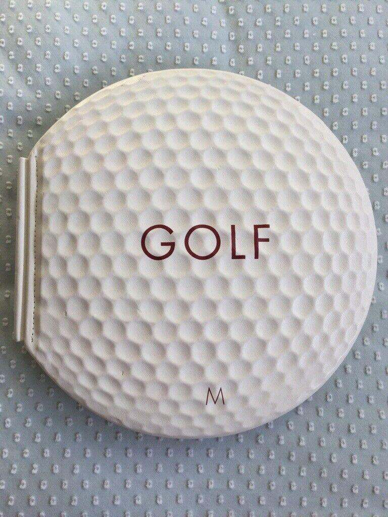 GOLF BOOK IN THE SHAPE OF GOLF BALL