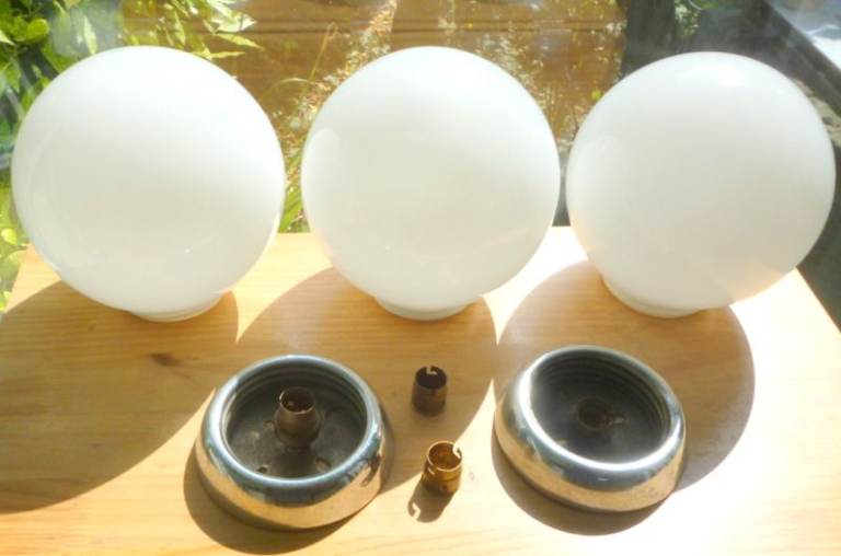 THREE VINTAGE OPALINE CEILING LIGHTS SHADES WITH TWO CHROME FITTINGS.
