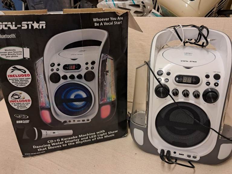 Karaoke machine with 2 mircophones
