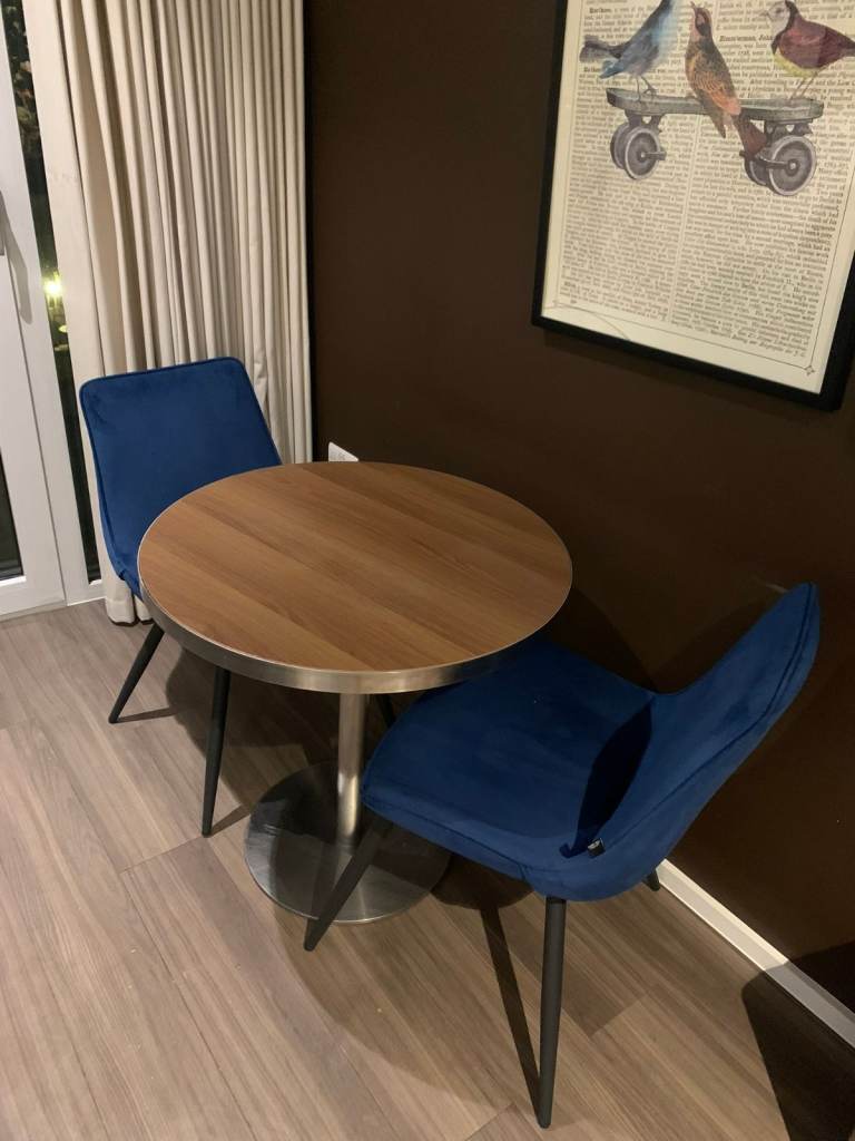 Small round dinning table with two chairs