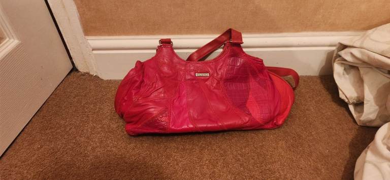 Brand new stefano red leather handbag
