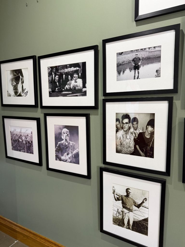 30 framed photos of legends in sport, music, film