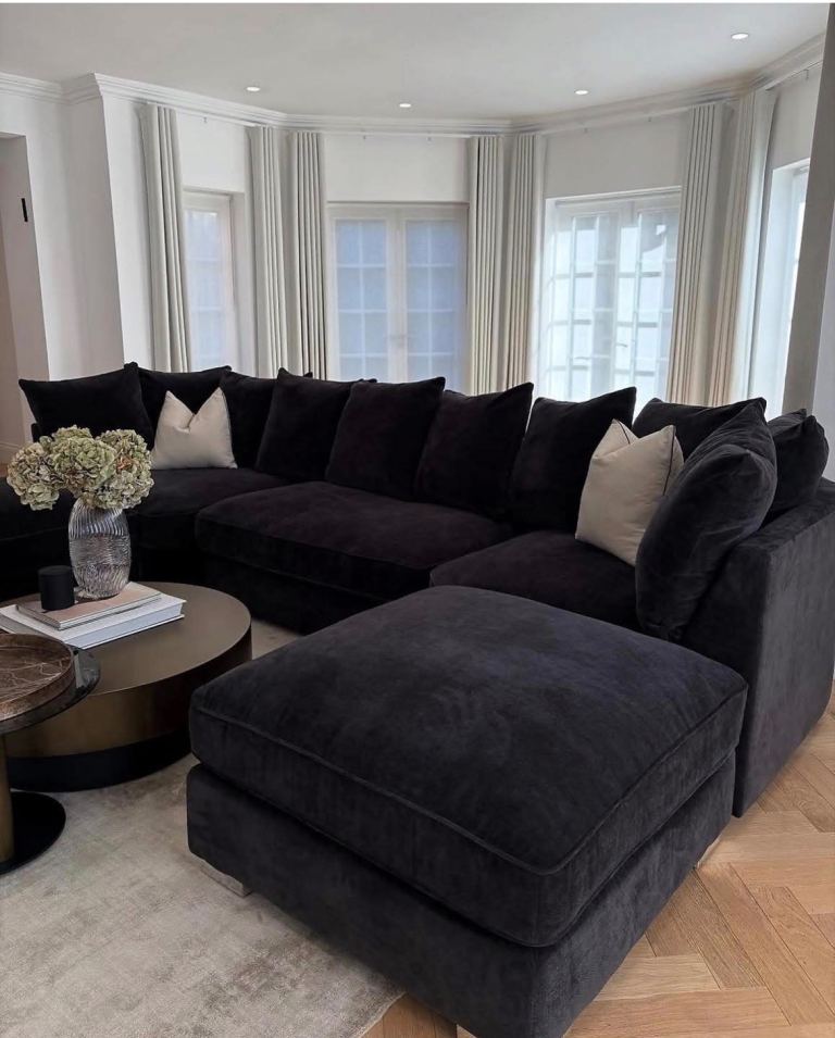 Large Black Corner Sofa with Ottoman – Great Condition
