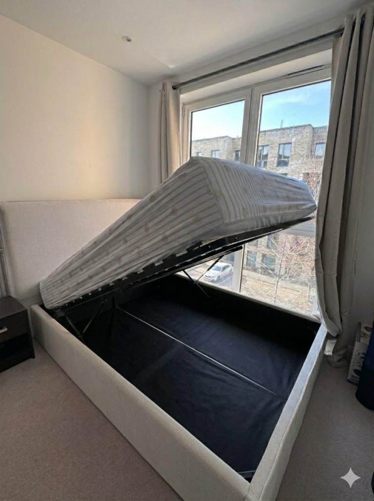 Double bed with mattress (used as guest bed) in great condition- Collection only