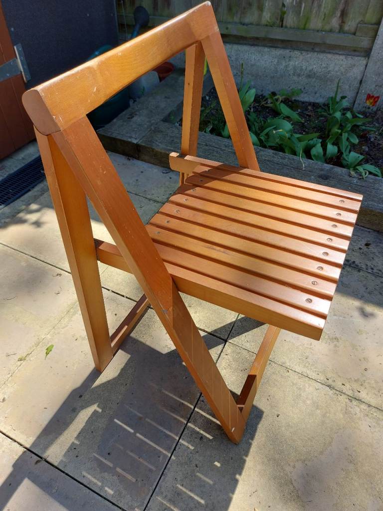 Single Slatted chair folds Flat.