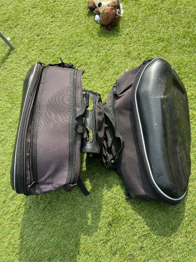 Motorbike side panniers - under seat straps. 